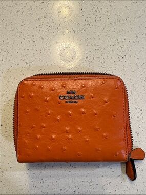 Coach Orange Embossed Zip Wallet